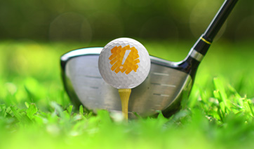 Close up of a golf ball on a tee